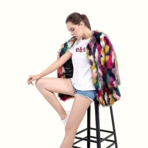 Multicolor Bomber Fur Jacket Sitting On A Stool With Coat On